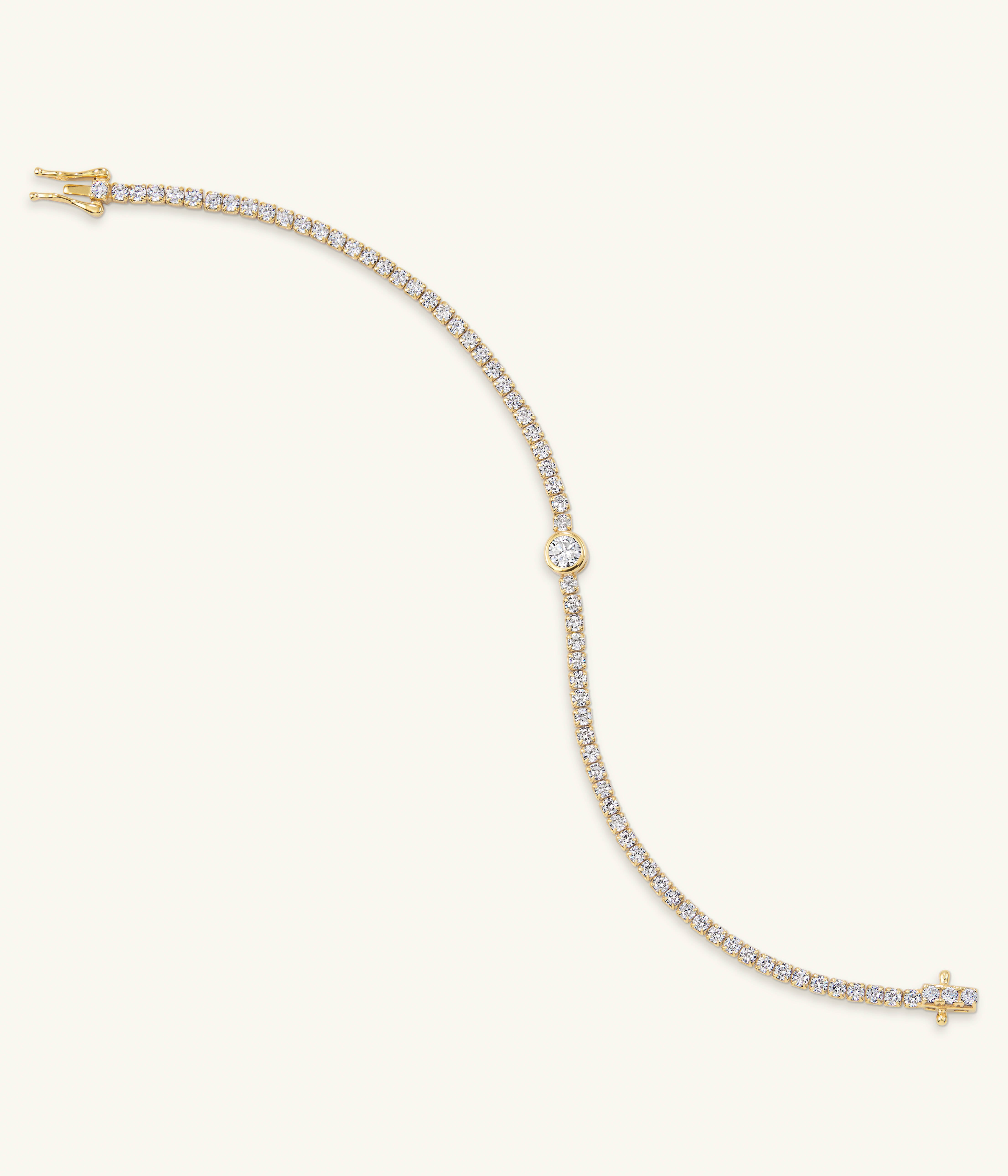 TENNIS BRACELET WITH DIAMOND CENTER – Haus of Urbi